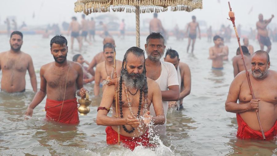 Tents for devotees cover the area at the Sangam, the confluence of the rivers Ganges and the Yamuna on 'Mauni Amavasya' or new moon day, an auspicious bathing day during the annual month long Hindu religious fair 