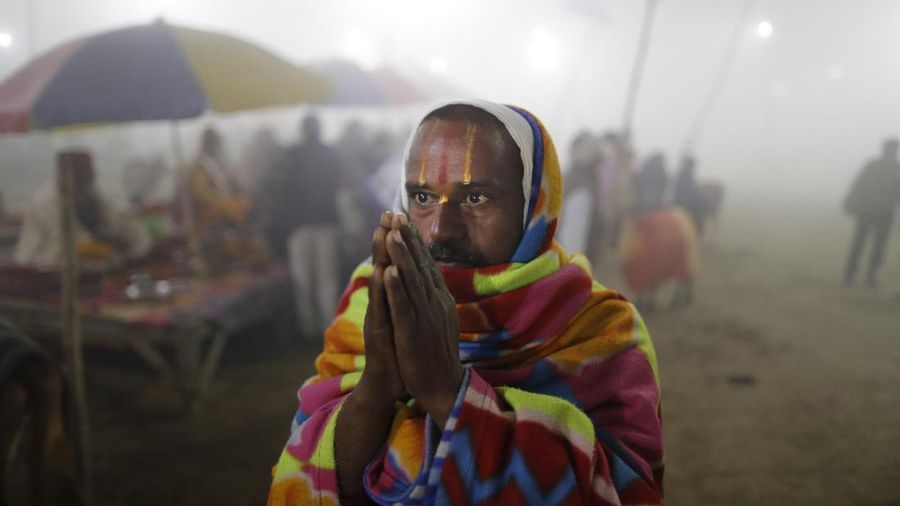 Tents for devotees cover the area at the Sangam, the confluence of the rivers Ganges and the Yamuna on 'Mauni Amavasya' or new moon day, an auspicious bathing day during the annual month long Hindu religious fair 