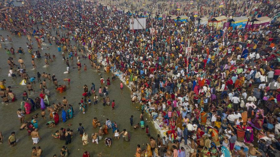 Tents for devotees cover the area at the Sangam, the confluence of the rivers Ganges and the Yamuna on 'Mauni Amavasya' or new moon day, an auspicious bathing day during the annual month long Hindu religious fair 