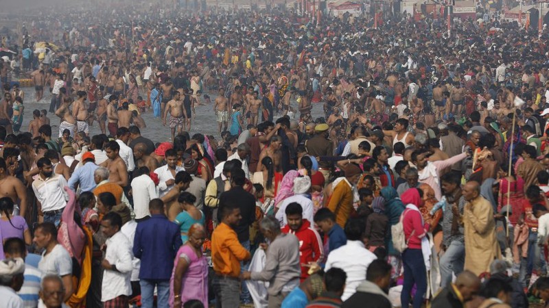 Tents for devotees cover the area at the Sangam, the confluence of the rivers Ganges and the Yamuna on 'Mauni Amavasya' or new moon day, an auspicious bathing day during the annual month long Hindu religious fair 
