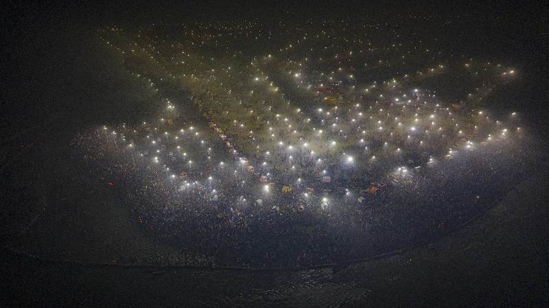 Tents for devotees cover the area at the Sangam, the confluence of the rivers Ganges and the Yamuna on 'Mauni Amavasya' or new moon day, an auspicious bathing day during the annual month long Hindu religious fair 