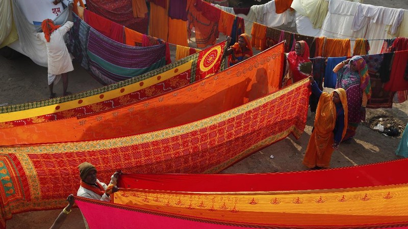 Tents for devotees cover the area at the Sangam, the confluence of the rivers Ganges and the Yamuna on 'Mauni Amavasya' or new moon day, an auspicious bathing day during the annual month long Hindu religious fair 