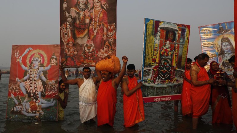Tents for devotees cover the area at the Sangam, the confluence of the rivers Ganges and the Yamuna on 'Mauni Amavasya' or new moon day, an auspicious bathing day during the annual month long Hindu religious fair 