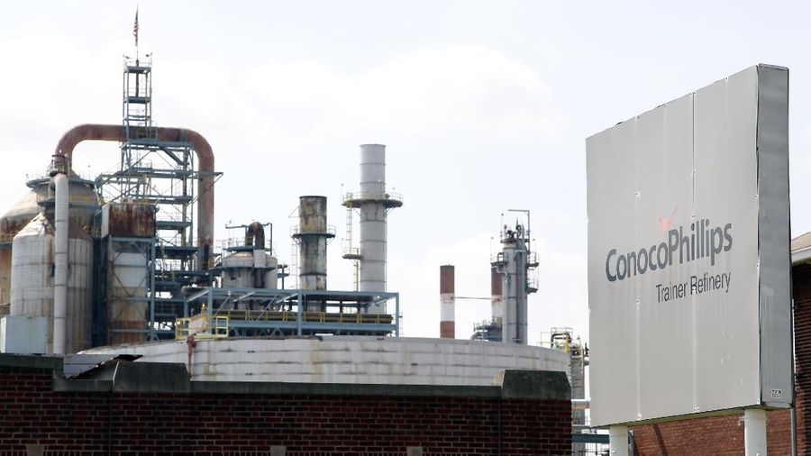In a Thursday, April 19, 2012 photo, the ConocoPhillips refinery is seen in Trainer, Pa. ConocoPhillips on Monday, April 23, 2012 reported first-quarter earnings of $2.9 billion, compared with first-quarter 2011 earnings of $3.0 billion. Excluding $330 million of special items, first-quarter 2012 adjusted earnings were $2.6 billion. Special items were primarily related to gains on asset dispositions, partially offset by impairments and repositioning costs. (AP Photo/Alex Brandon)