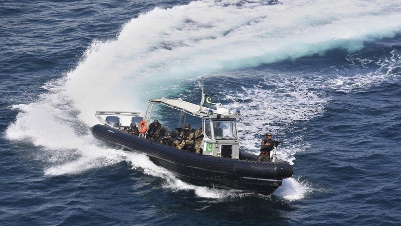 Warships from various countries take part in multinational military exercise, “Aman” or peace exercise in the Arabian Sea near Karachi, Pakistan, Monday, Feb. 15, 2021. Warships over 40 countries including the United States, Russia, Britain and China are participating the five-day multinational exercise hosted by Pakistan Navy in the Arabian Sea as part of Islamabad's years-long effort to bring security to the area, Pakistan navy said. (AP Photo/Mohammad Farooq)