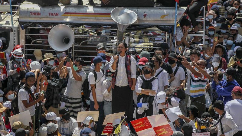 Demonstrators gather in an intersection close to Sule Pagoda to protest against the military coup in Yangon, Myanmar Wednesday, Feb. 17, 2021. The U.N. expert on human rights in Myanmar warned of the prospect for major violence as demonstrators gather again Wednesday to protest the military's seizure of power. (AP Photo)