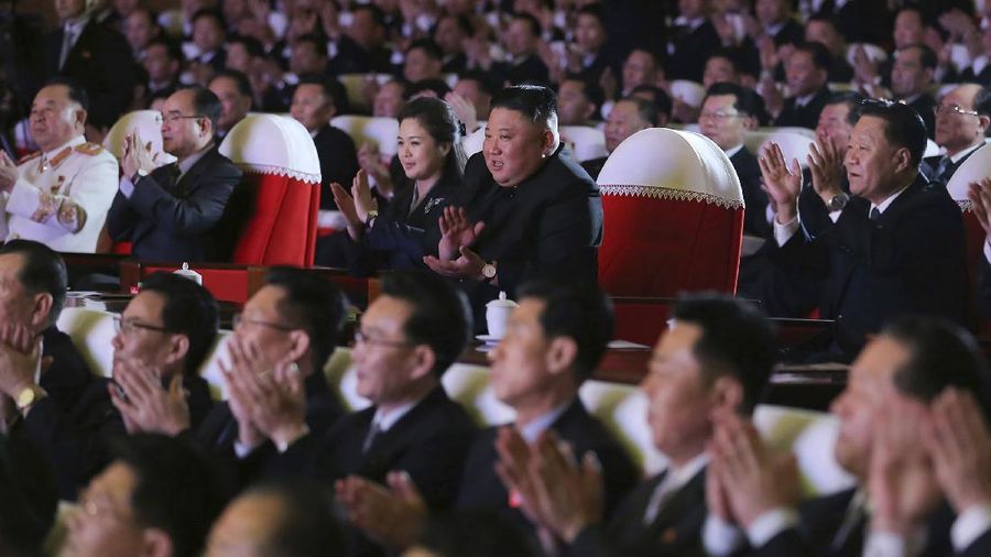 In this photo provided by the North Korean government, North Korean leader Kim Jong Un, center, and his wife Ri Sol Ju watch a performance marking the birth anniversary of former leader Kim Jong Il, in Pyongyang, North Korea, Tuesday, Feb. 16, 2021. Ri has reappeared in North Korea's state media for the first time in just over year. Independent journalists were not given access to cover the event depicted in this image distributed by the North Korean government. The content of this image is as provided and cannot be independently verified. Korean language watermark on image as provided by source reads: 