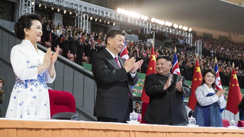 In this photo provided by the North Korean government, North Korean leader Kim Jong Un, center, and his wife Ri Sol Ju watch a performance marking the birth anniversary of former leader Kim Jong Il, in Pyongyang, North Korea, Tuesday, Feb. 16, 2021. Ri has reappeared in North Korea's state media for the first time in just over year. Independent journalists were not given access to cover the event depicted in this image distributed by the North Korean government. The content of this image is as provided and cannot be independently verified. Korean language watermark on image as provided by source reads: 