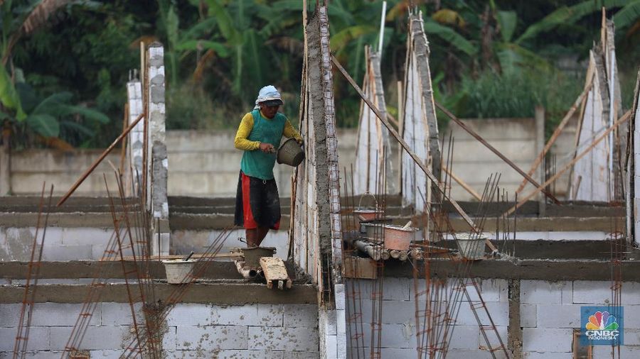 Suasana proyek pembangunan perumahan di Depok, Jawa Barat, Rabu (17/2/2021). Harga hunian rumah masih menunjukkan kenaikan pada kuartal IV-2020 namun laju kenaikan melambat. (CNBC Indonesia/Tri Susilo)