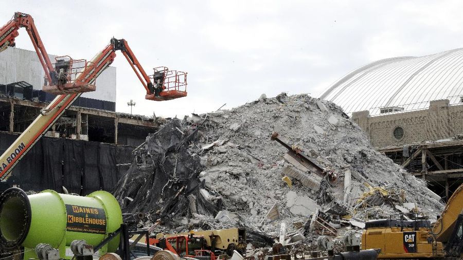 The former Trump Plaza Hotel & Casino implodes in Atlantic City, N.J., Wednesday, Feb 17, 2021.The former Trump Plaza casino was imploded after falling into such disrepair that chunks of the building began peeling off and crashing to the ground.  (Edward Lea/The Press of Atlantic City via AP)