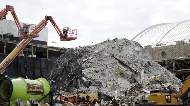 The former Trump Plaza Hotel & Casino implodes in Atlantic City, N.J., Wednesday, Feb 17, 2021.The former Trump Plaza casino was imploded after falling into such disrepair that chunks of the building began peeling off and crashing to the ground.  (Edward Lea/The Press of Atlantic City via AP)