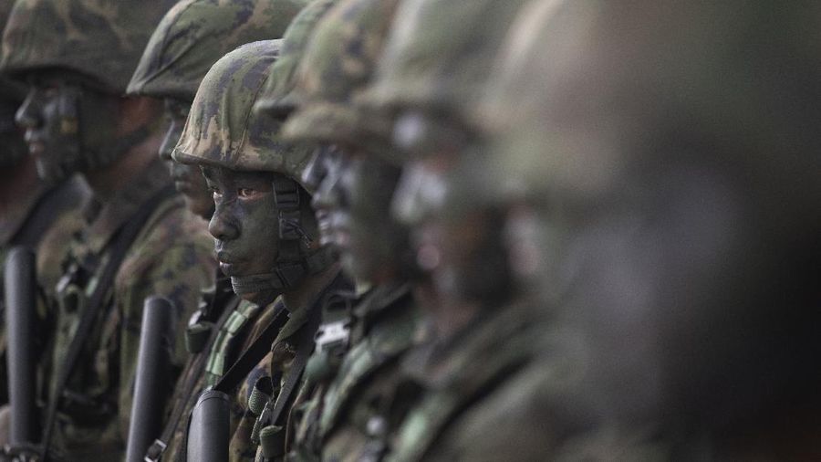 Thai soldiers take their position in front of an amphibious assault vehicle after landing during the ongoing Cobra Gold U.S.-Thai joint military exercise on Hat Yao beach in Chonburi province, eastern Thailand, Saturday, Feb. 16, 2019. Cobra Gold military exercise is the biggest activity of its type in the Asia-Pacific region with 29 nations taking part as participants or observers. (AP Photo/Sakchai Lalit)