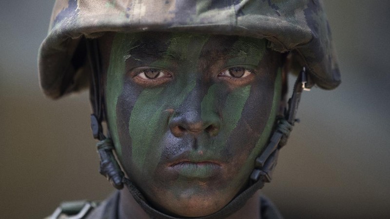 Thai soldiers take their position in front of an amphibious assault vehicle after landing during the ongoing Cobra Gold U.S.-Thai joint military exercise on Hat Yao beach in Chonburi province, eastern Thailand, Saturday, Feb. 16, 2019. Cobra Gold military exercise is the biggest activity of its type in the Asia-Pacific region with 29 nations taking part as participants or observers. (AP Photo/Sakchai Lalit)
