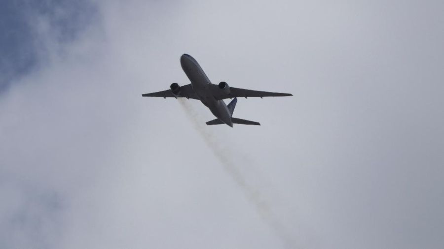 This Saturday, Feb. 20, 2021 photo provided by Hayden Smith shows United Airlines Flight 328 approaching Denver International Airport, after experiencing 