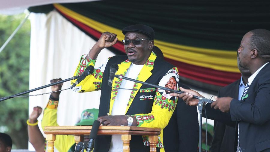 Zimbabwean deputy president Kembo Mohadi addresses the crowd, at a rally in Mount Darwin about 200 Kilometres north of Harare, Saturday, Feb, 2, 2019. A spokesman says Zimbabwe's president has skipped his first political rally since last month's deadly military crackdown on protests so he could explain the unrest to fellow African leaders. President Emmerson Mnangagwa's administration has been under pressure amid reports of at least 12 people killed, hundreds wounded and some women raped. (AP Photo/Tsvangirayi Mukwazhi)