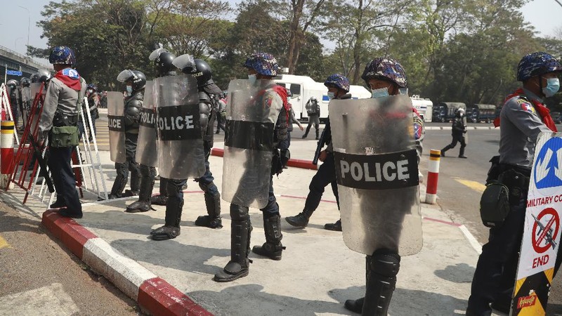A protester show bullets, shotgun shells and rubber bullets used by security forces during a demonstration against the military coup in Mandalay, Myanmar, Friday, Feb. 26, 2021. (AP Photo)