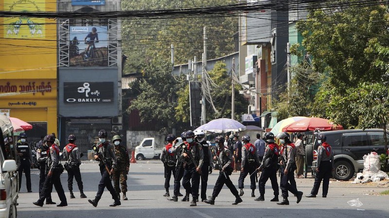 A protester show bullets, shotgun shells and rubber bullets used by security forces during a demonstration against the military coup in Mandalay, Myanmar, Friday, Feb. 26, 2021. (AP Photo)