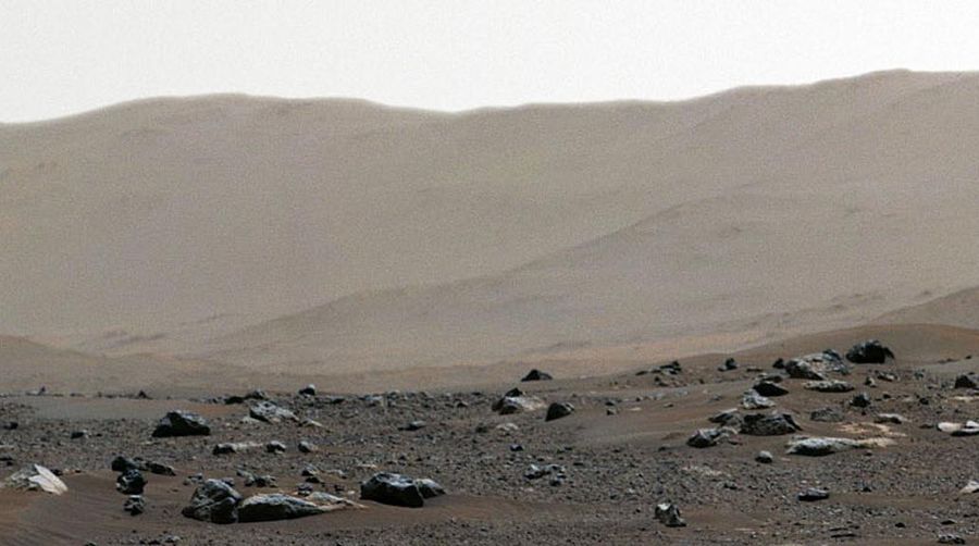 This section of a composite image made available by NASA, produced from photos captured Feb. 21, 2021 by the Perseverance Mars rover shows the rim of Jezero Crater on the surface of Mars. It landed on Thursday, Feb. 18. (NASA/JPL-Caltech via AP)