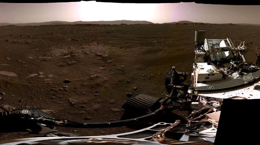 This composite image made available by NASA, produced from photos captured Feb. 20, 2021 by the Perseverance Mars rover, shows the surface of Mars. It landed on Thursday, Feb. 18. (NASA/JPL-Caltech via AP)