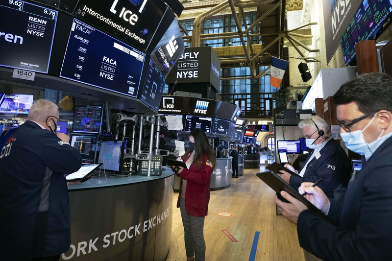 Emiten Wall Street. AP Emiten Wall Street. AP