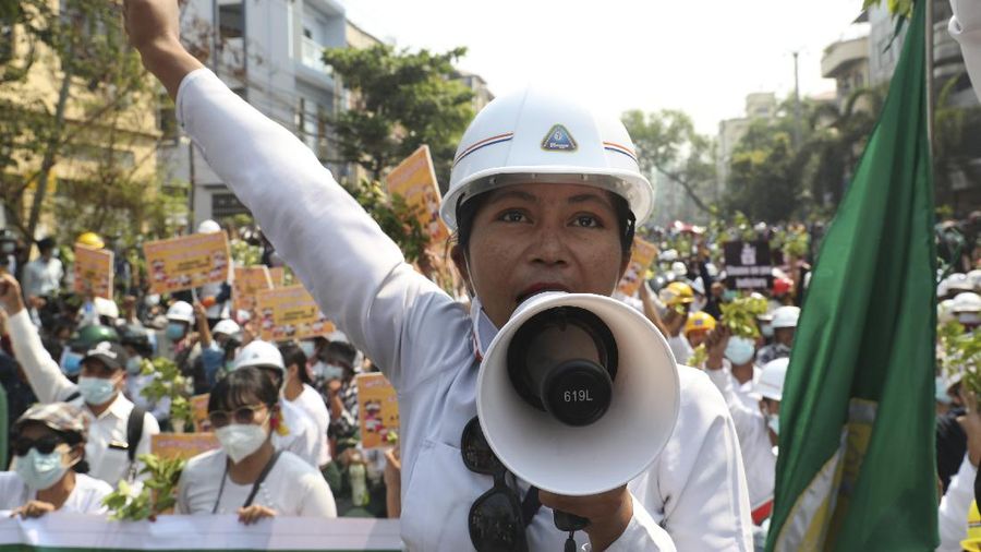 Protesters march on main road during an anti-coup demonstration in Mandalay, Myanmar, Sunday, March 7, 2021. The escalation of violence in Myanmar as authorities crack down on protests against the Feb. 1 coup is raising pressure for more sanctions against the junta, even as countries struggle over how to best sway military leaders inured to global condemnation. (AP Photo)