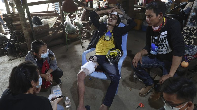 Riot police officers hold down a protester as they disperse protesters in Tharkata Township on the outskirts of Yangon, Myanmar, Saturday, March 6, 2021. The U.N. special envoy for Myanmar on Friday called for urgent Security Council action, saying multiple peaceful protesters were killed and injured in the military's worst crackdowns this week. (AP Photo)