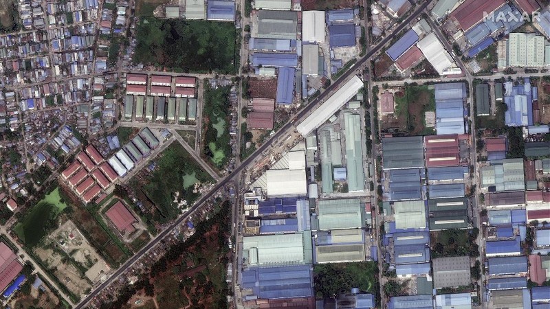 This combination image of March 9, 2021, top, and March 15, 2021, satellite images provided Maxar Technologies shows Global Fashion Garment Factory, a Chinese-owned supplier to the fashion retailer C&A, in Yangon, Myanmar. Attacks on Chinese-run factories in Myanmar's biggest city drew demands from Beijing for protection for their property and employees, while many in Myanmar expressed outrage over China's apparent lack of concern for those killed in protests against last month's military coup. (©2021 Maxar Technologies via AP)