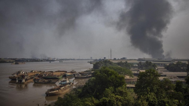 This combination image of March 9, 2021, top, and March 15, 2021, satellite images provided Maxar Technologies shows Global Fashion Garment Factory, a Chinese-owned supplier to the fashion retailer C&A, in Yangon, Myanmar. Attacks on Chinese-run factories in Myanmar's biggest city drew demands from Beijing for protection for their property and employees, while many in Myanmar expressed outrage over China's apparent lack of concern for those killed in protests against last month's military coup. (©2021 Maxar Technologies via AP)