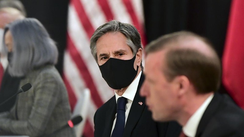 Secretary of State Antony Blinken, second from right, listens as national security adviser Jake Sullivan, right, speaks at the opening session of US-China talks at the Captain Cook Hotel in Anchorage, Alaska, Thursday, March 18, 2021. (Frederic J. Brown/Pool via AP)