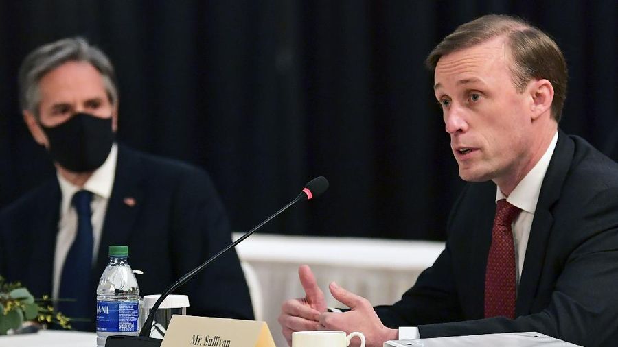 Secretary of State Antony Blinken, second from right, listens as national security adviser Jake Sullivan, right, speaks at the opening session of US-China talks at the Captain Cook Hotel in Anchorage, Alaska, Thursday, March 18, 2021. (Frederic J. Brown/Pool via AP)