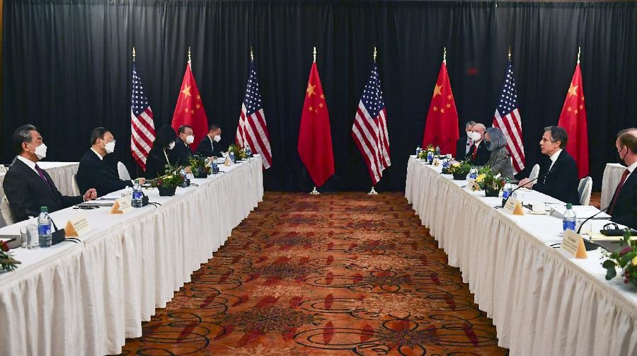 Secretary of State Antony Blinken, second from right, listens as national security adviser Jake Sullivan, right, speaks at the opening session of US-China talks at the Captain Cook Hotel in Anchorage, Alaska, Thursday, March 18, 2021. (Frederic J. Brown/Pool via AP)