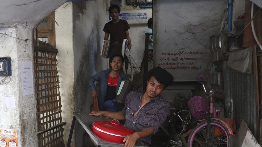 State railway employees load their belongings after being evicted from their home Saturday, March 20, 2021, in Mandalay, Myanmar. State railway workers in Mandalay have been threatened with eviction to force them to end their support for the Civil Disobedience Movement (CDM) against military rule. (AP Photo)