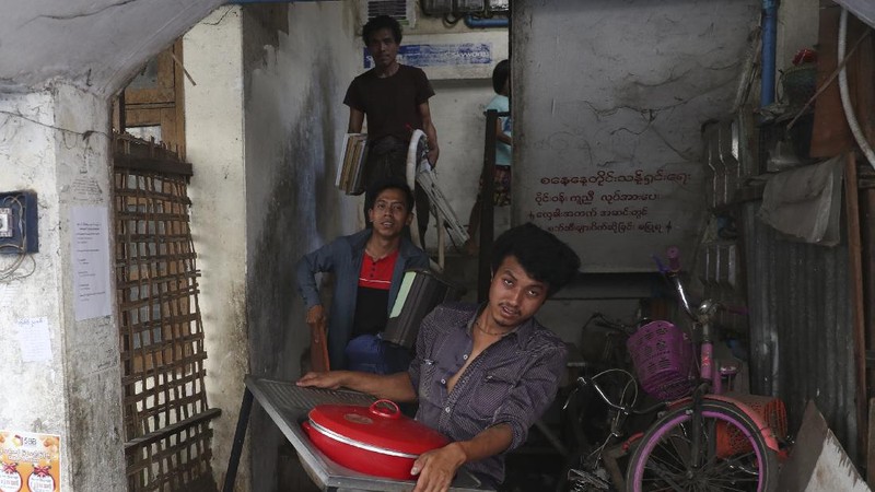 State railway employees load their belongings after being evicted from their home Saturday, March 20, 2021, in Mandalay, Myanmar. State railway workers in Mandalay have been threatened with eviction to force them to end their support for the Civil Disobedience Movement (CDM) against military rule. (AP Photo)