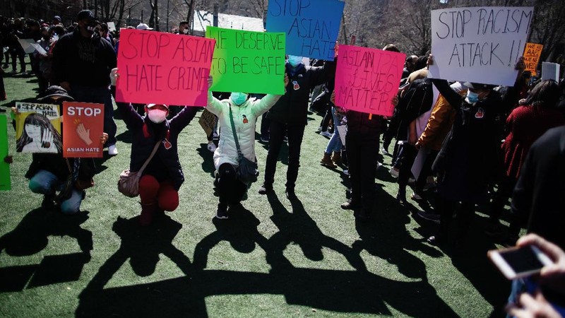 People take part in a rally against hate and confront the rising violence against Asian Americans at Columbus Park in the Chinatown section of Manhattan borough of New York, on Sunday, March 21, 2021.  (AP Photo/Eduardo Munoz Alvarez)