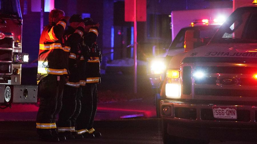 Police work on the scene outside of a King Soopers grocery store where a shooting took place Monday, March 22, 2021, in Boulder, Colo. (AP Photo/David Zalubowski)