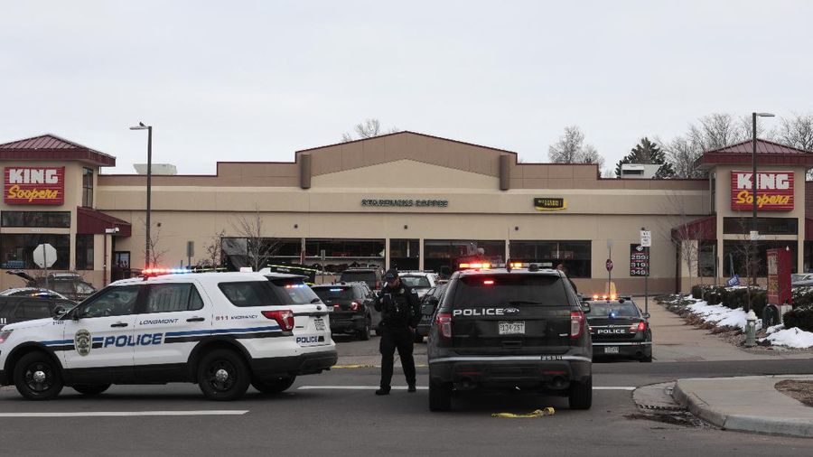 Police work on the scene outside of a King Soopers grocery store where a shooting took place Monday, March 22, 2021, in Boulder, Colo. (AP Photo/David Zalubowski)