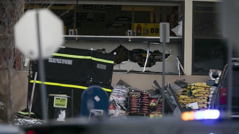 Police work on the scene outside of a King Soopers grocery store where a shooting took place Monday, March 22, 2021, in Boulder, Colo. (AP Photo/David Zalubowski)