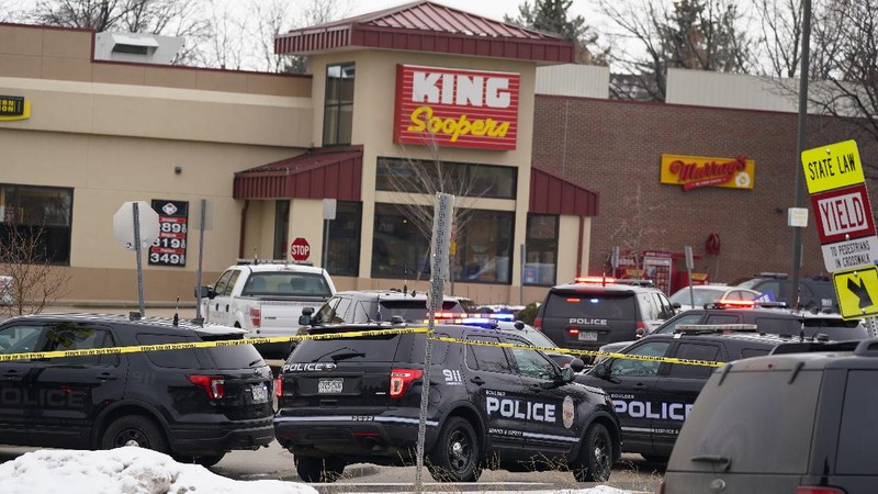 Police work on the scene outside of a King Soopers grocery store where a shooting took place Monday, March 22, 2021, in Boulder, Colo. (AP Photo/David Zalubowski)