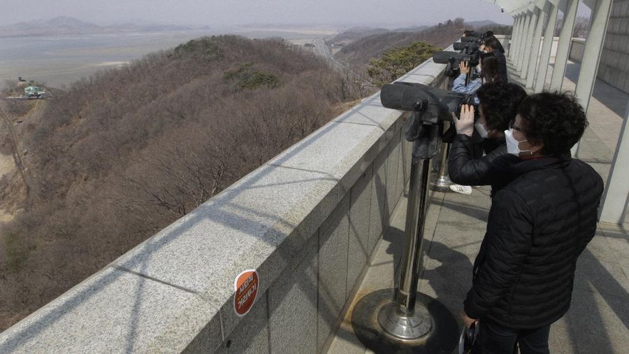 Military guard posts of North Korea, rear, and South Korea, bottom, are seen in Paju, at the border with North Korea, South Korea, Wednesday, March 24, 2021. North Korea fired short-range missiles this past weekend, just days after the sister of Kim Jong Un threatened the United States and South Korea for holding joint military exercises. (AP Photo/Ahn Young-joon)