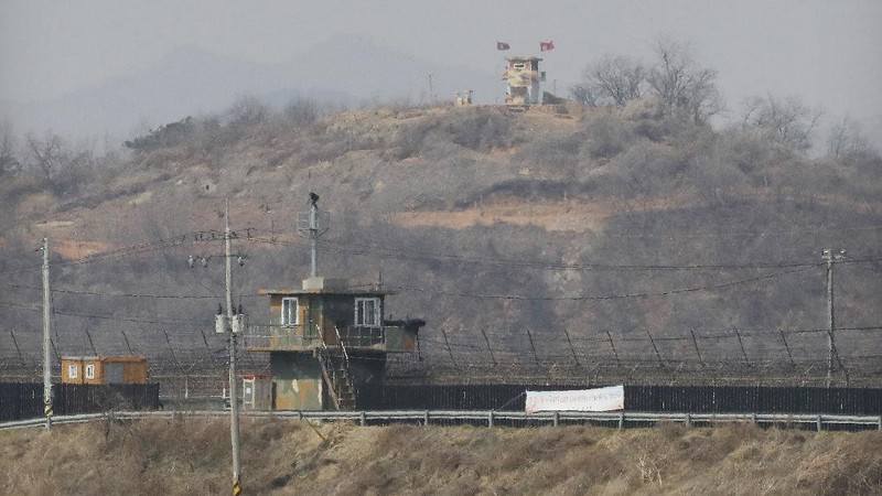 Military guard posts of North Korea, rear, and South Korea, bottom, are seen in Paju, at the border with North Korea, South Korea, Wednesday, March 24, 2021. North Korea fired short-range missiles this past weekend, just days after the sister of Kim Jong Un threatened the United States and South Korea for holding joint military exercises. (AP Photo/Ahn Young-joon)