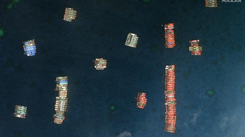 This satellite image provided by Maxar Technologies shows Chinese vessels anchored the Whitsun Reef located in the disputed South China Sea. Tuesday, March 23, 2021. The United States said Tuesday it’s backing the Philippines in a new standoff with Beijing in the disputed South China Sea, where Manila has asked a Chinese fishing flotilla to leave a reef. China ignored the call, insisting it owns the offshore territory. (©2021 Maxar Technologies via AP)