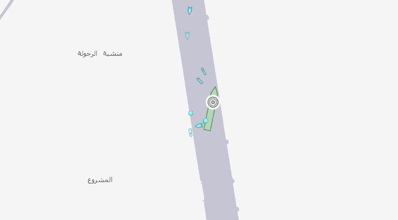 Ever Given, a Panama-flagged cargo ship that is wedged across the Suez Canal and blocking traffic in the vital waterway is seen Sunday, March 28, 2021. The massive Ever Given, a Panama-flagged, Japanese-owned ship that carries cargo between Asia and Europe, got stuck Tuesday in a single-lane stretch of the canal. In the time since, authorities have been unable to remove the vessel and traffic through the canal has been halted,(AP Photo/Mohamed Elshahed)