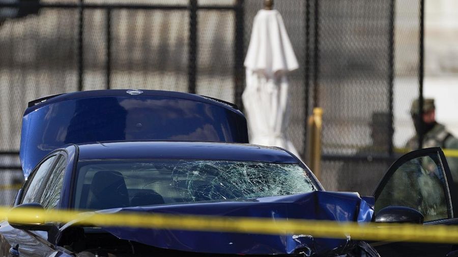 The car that crashed into a barrier on Capitol Hill is seen near the Senate side of the U.S. Capitol in Washington, Friday, April 2, 2021. (AP Photo/Carolyn Kaster)