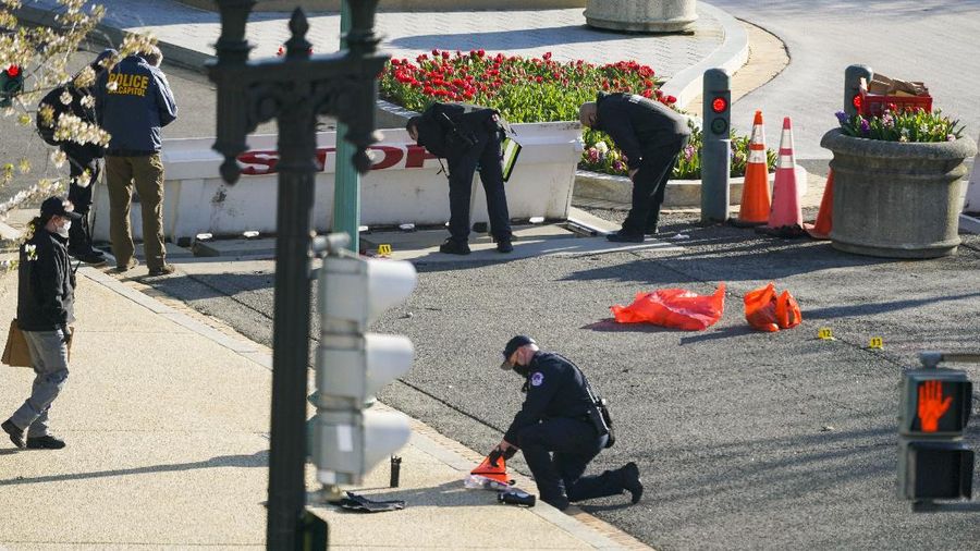The car that crashed into a barrier on Capitol Hill is seen near the Senate side of the U.S. Capitol in Washington, Friday, April 2, 2021. (AP Photo/Carolyn Kaster)
