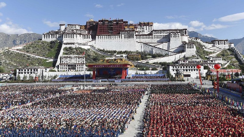 In this photo released by China's Xinhua News Agency, a grand ceremony marking the 50th anniversary of the founding of the Tibet Autonomous Region is held at the square of the Potala Palace in Lhasa, capital of southwest China's Tibet Autonomous Region, Tuesday, Sept. 8, 2015. (Chen Yehua/Xinhua via AP) NO SALES