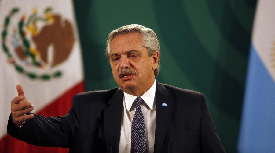 FILE - In this Feb. 23, 2021 file photo, Argentina's President Alberto Fernandez speaks during Mexican President Andrés Manuel Lopez Obrador's daily, morning news conference at the National Palace in Mexico City.   Fernandez says he had an initial positive test for COVID-19, despite having been vaccinated in January. Fernandez sent a tweet late Friday, April 2,  saying took a quick antigen test for the virus after feeling a headache and experiencing a fever of 37.3 Celsius (99.1 Fahrenheit). (AP Photo/Marco Ugarte, File)