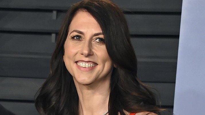 MacKenzie Scott FILE - In this March 4, 2018, file photo, then-MacKenzie Bezos arrives at the Vanity Fair Oscar Party in Beverly Hills, Calif. Scott, philanthropist, author and former wife of Amazon founder Jeff Bezos, has married a Seattle science teacher. Dan Jewett wrote in a letter to the website of the nonprofit organization the Giving Pledge, on Saturday, March 6, 2021, that he was grateful to be able to marry such a generous person and was ready to help her give away her wealth to help others. (Photo by Evan Agostini/Invision/AP, File)