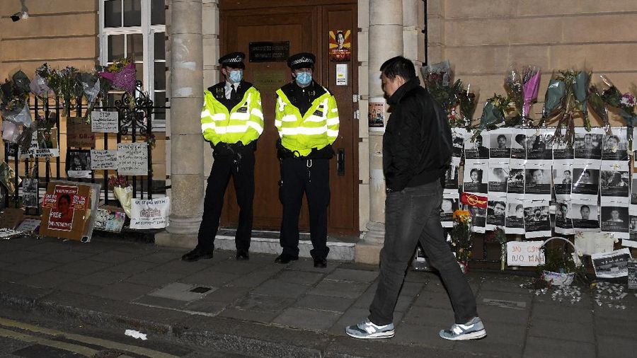 Kyaw Zwar Minn, the Myanmar ambassador, walks outside the Myanmar Embassy in London, Wednesday, April 7, 2021. Newspaper reports say the embassy was taken over by members of the country's new military regime Wednesday evening. (AP Photo/Alberto Pezzali)