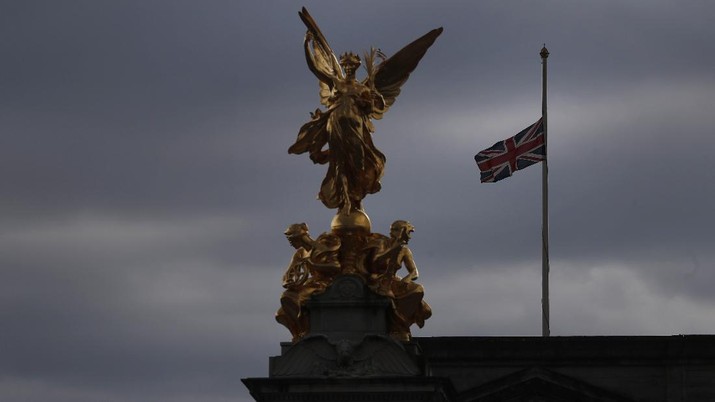 The Union flag flies at half mast over Buckingham Palace in London, Friday, April 9, 2021. Buckingham Palace officials say Prince Philip, the husband of Queen Elizabeth II, has died. He was 99. (AP Photo/Alastair Grant)