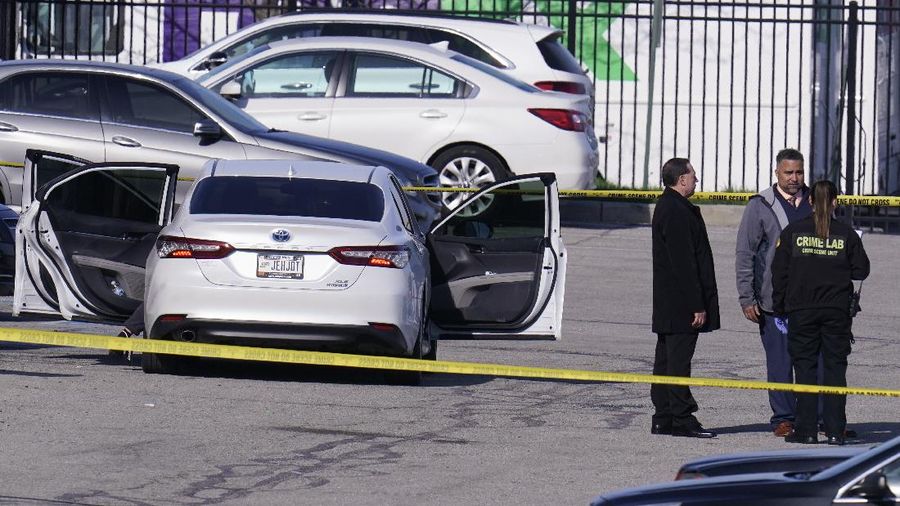 Police arrive at the scene where multiple people were reportedly shot at the FedEx Ground facility early Friday, April 16, 2021, in Indianapolis, Indiana. Multiple people were shot and killed in a late-night shooting at a FedEx facility in Indianapolis, and the shooter killed himself, police said. (Mykal McEldowney/The Indianapolis Star via AP)